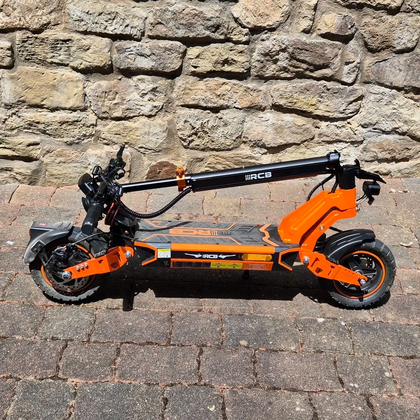 RCB All-Terrain Electric Scooter- Ready for Rough Roads Built to handle more than pavement. This RCB scooter features aggressive off-road tires, front and rear suspension