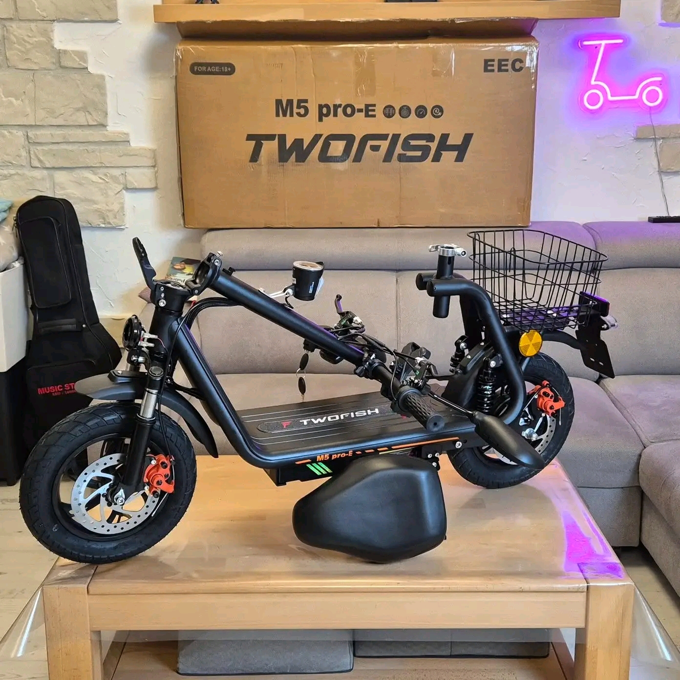TWOFISH M5 Pro-E-Comfort-First Electric Commuting Skip the standing commute. The Pro-E is built for riders who want a real seat, real storage, and real stability