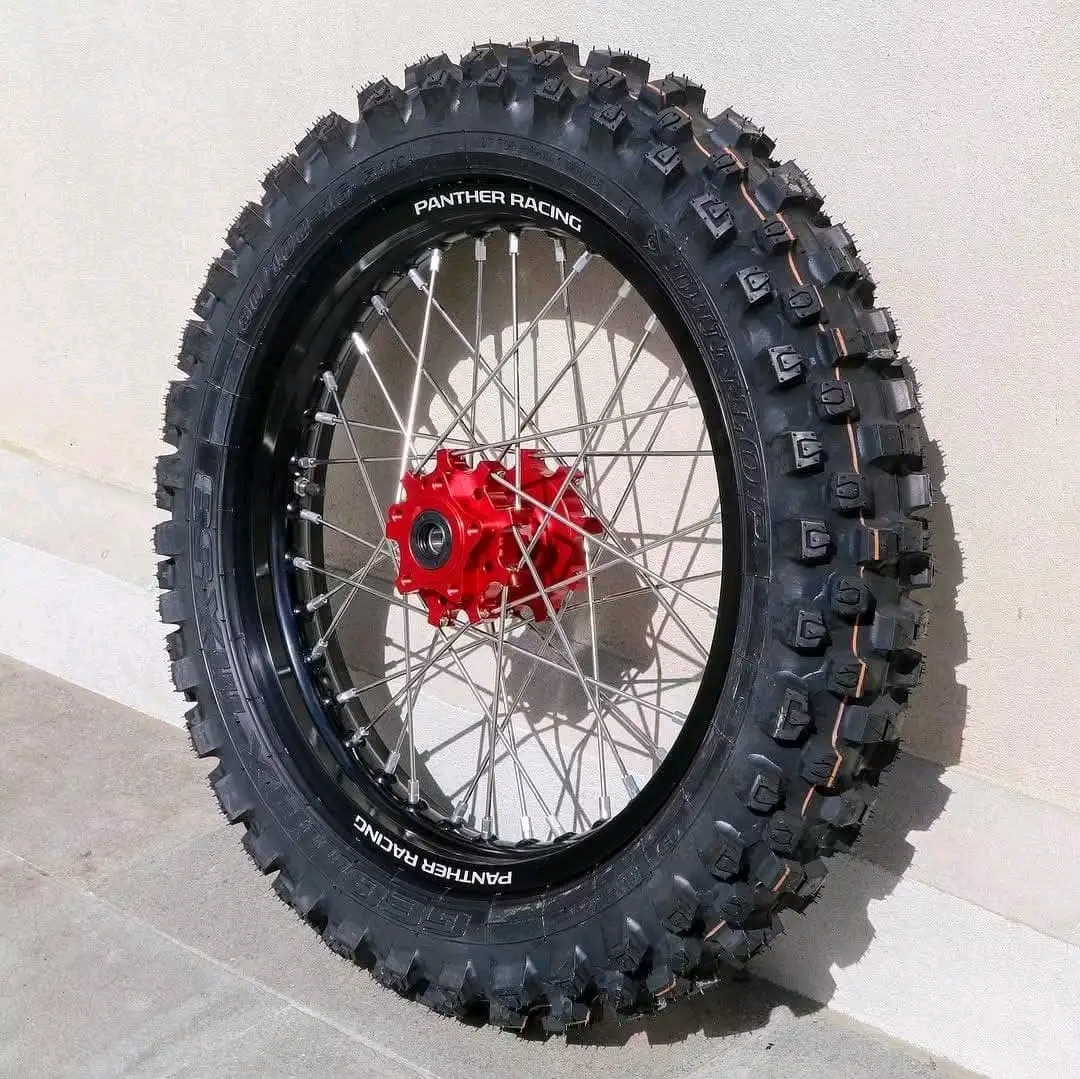 Panther's Racing Division 16" rear wheel upgrade for Surron Light Bee X Features: -Upgraded strength hubs, rims & spokes -2.15" rim thickness for lateral hit strength Dunlop MX5390/100 16