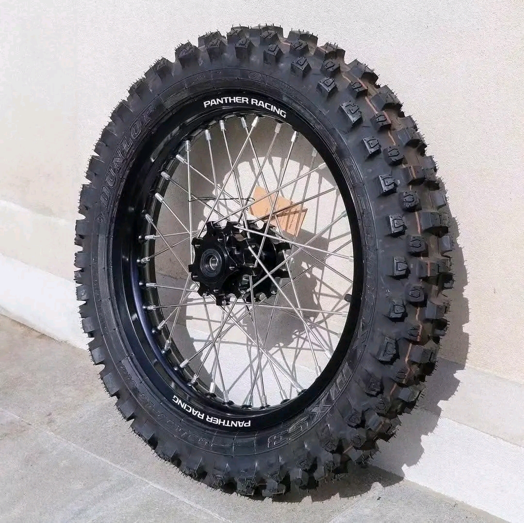 Panther's Racing Division 16" rear wheel upgrade for Surron Light Bee X Features: -Upgraded strength hubs, rims & spokes -2.15" rim thickness for lateral hit strength Dunlop MX5390/100 16
