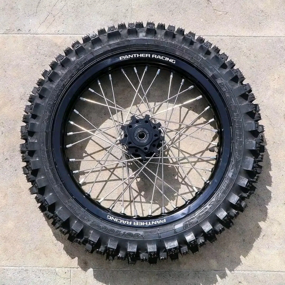 Panther's Racing Division 16" rear wheel upgrade for Surron Light Bee X Features: -Upgraded strength hubs, rims & spokes -2.15" rim thickness for lateral hit strength Dunlop MX5390/100 16